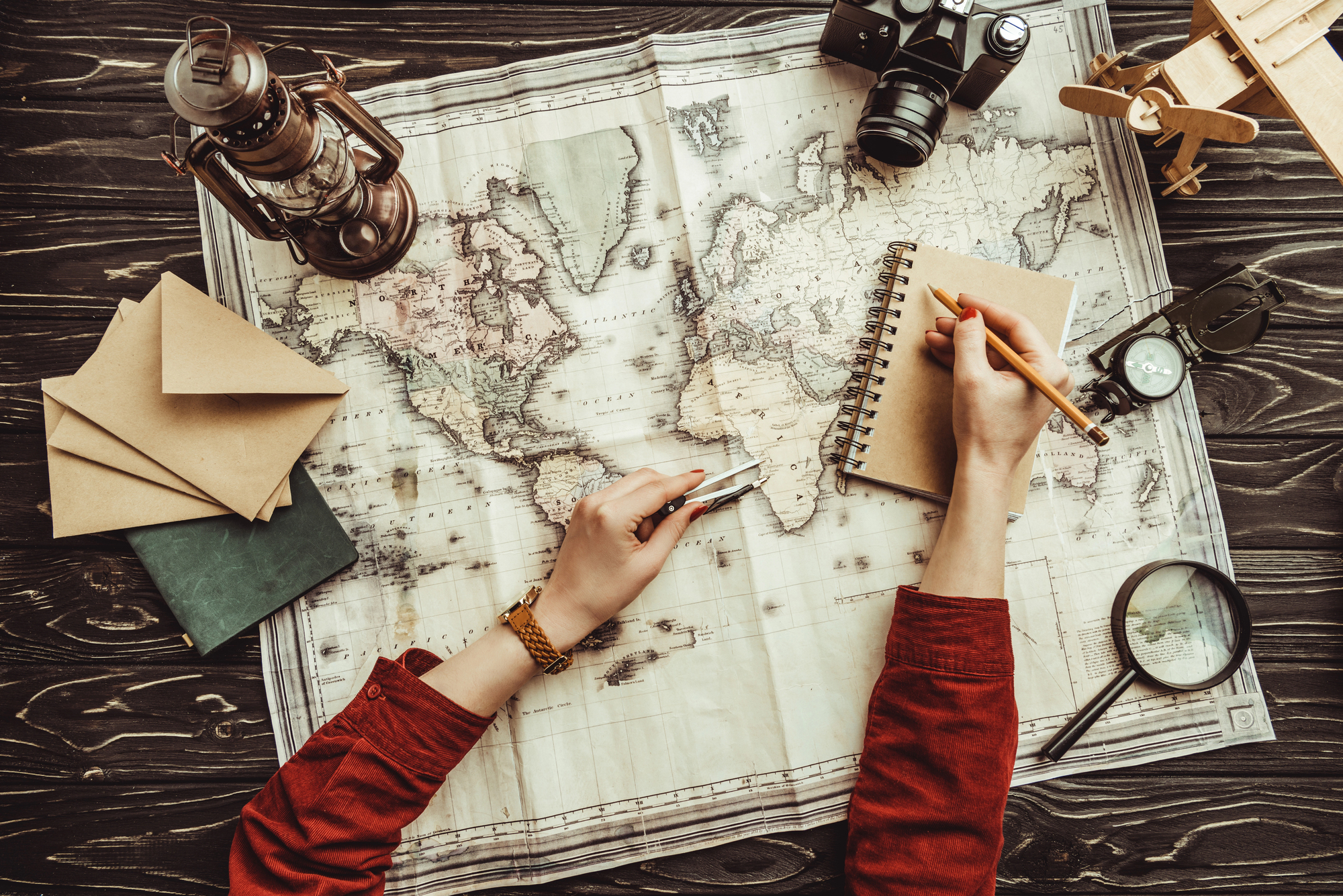 Travel advisor reviewing a map to avoid common travel planning mistakes